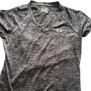 Conquer Your Fitness Goals in Style with the Under Armour Unisex Shirt!
